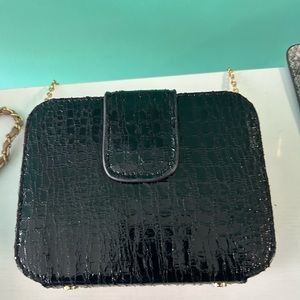 Ladies small black dressy handbag with gold chain